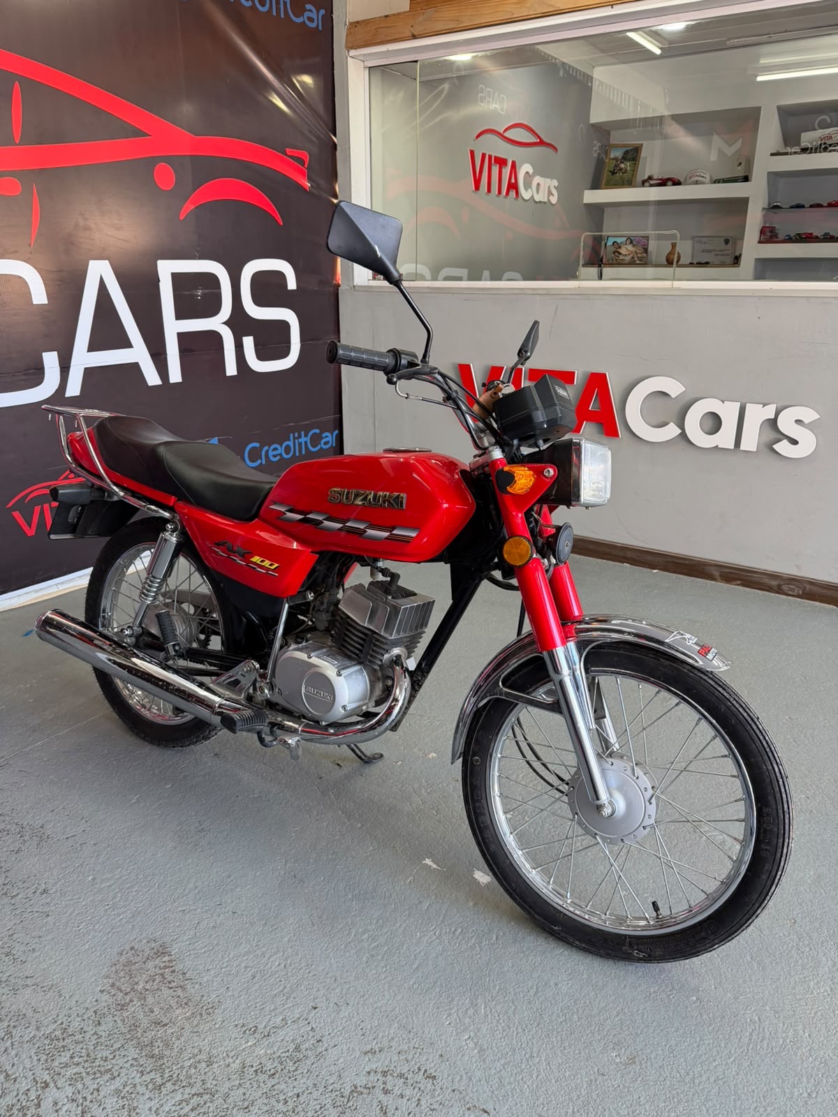 Suzuki AX 100 — foto 2