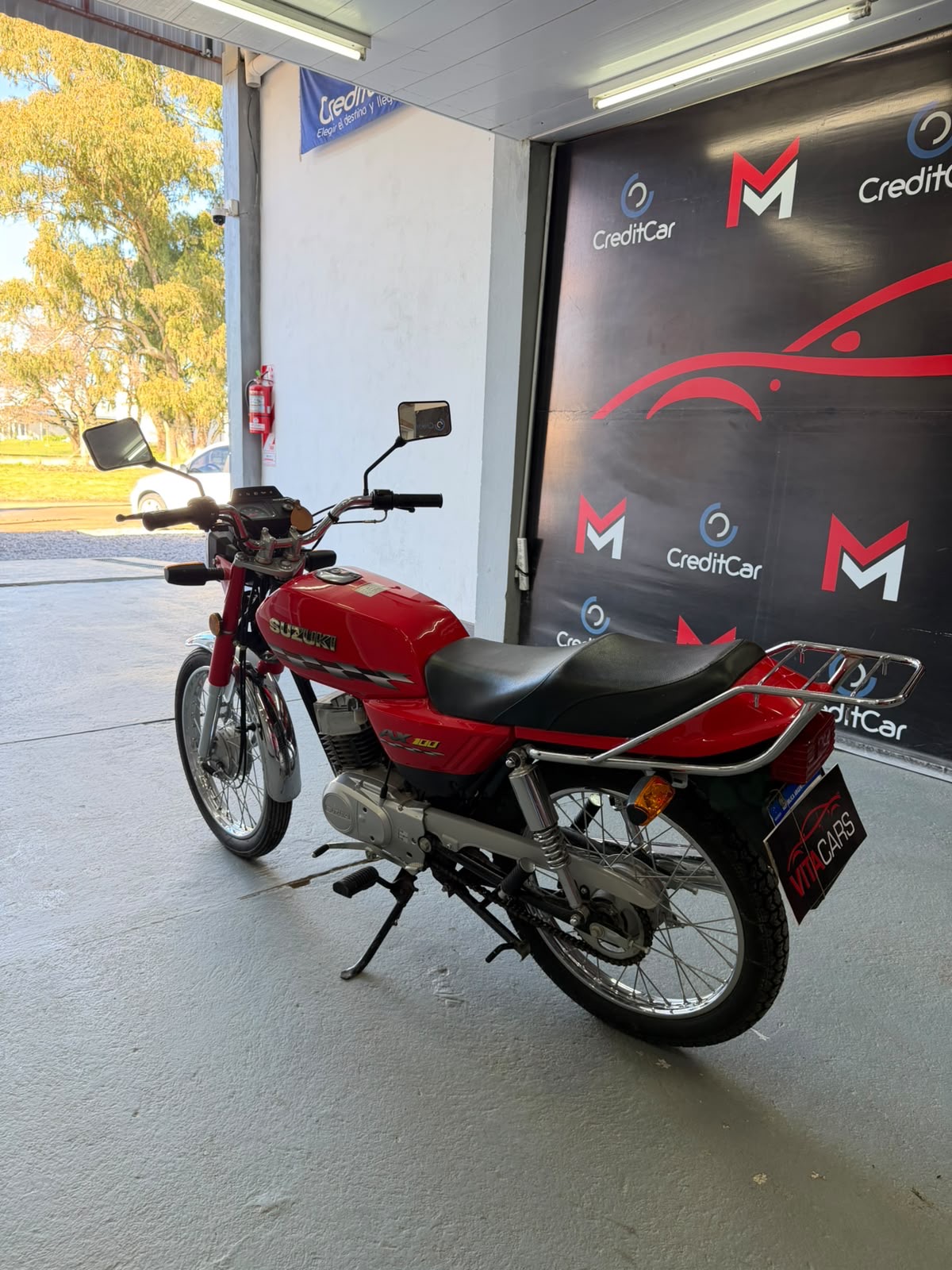 Suzuki AX 100 — foto 5