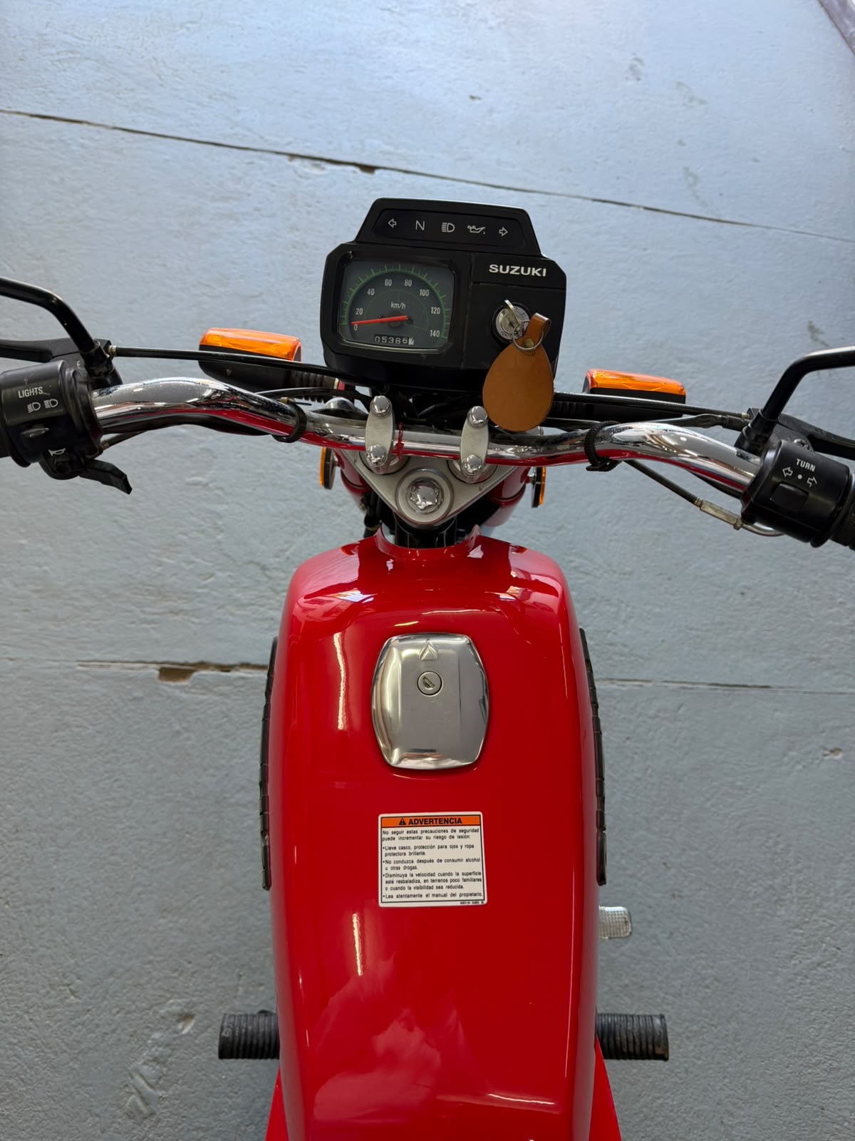 Suzuki AX 100 — foto 6